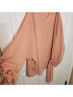 Peach V-Neck Blouse with Bow Sleeves